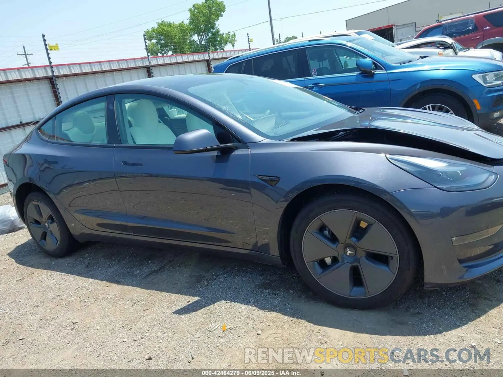 13 Photograph of a damaged car 5YJ3E1EB0PF631633 TESLA MODEL 3 2023