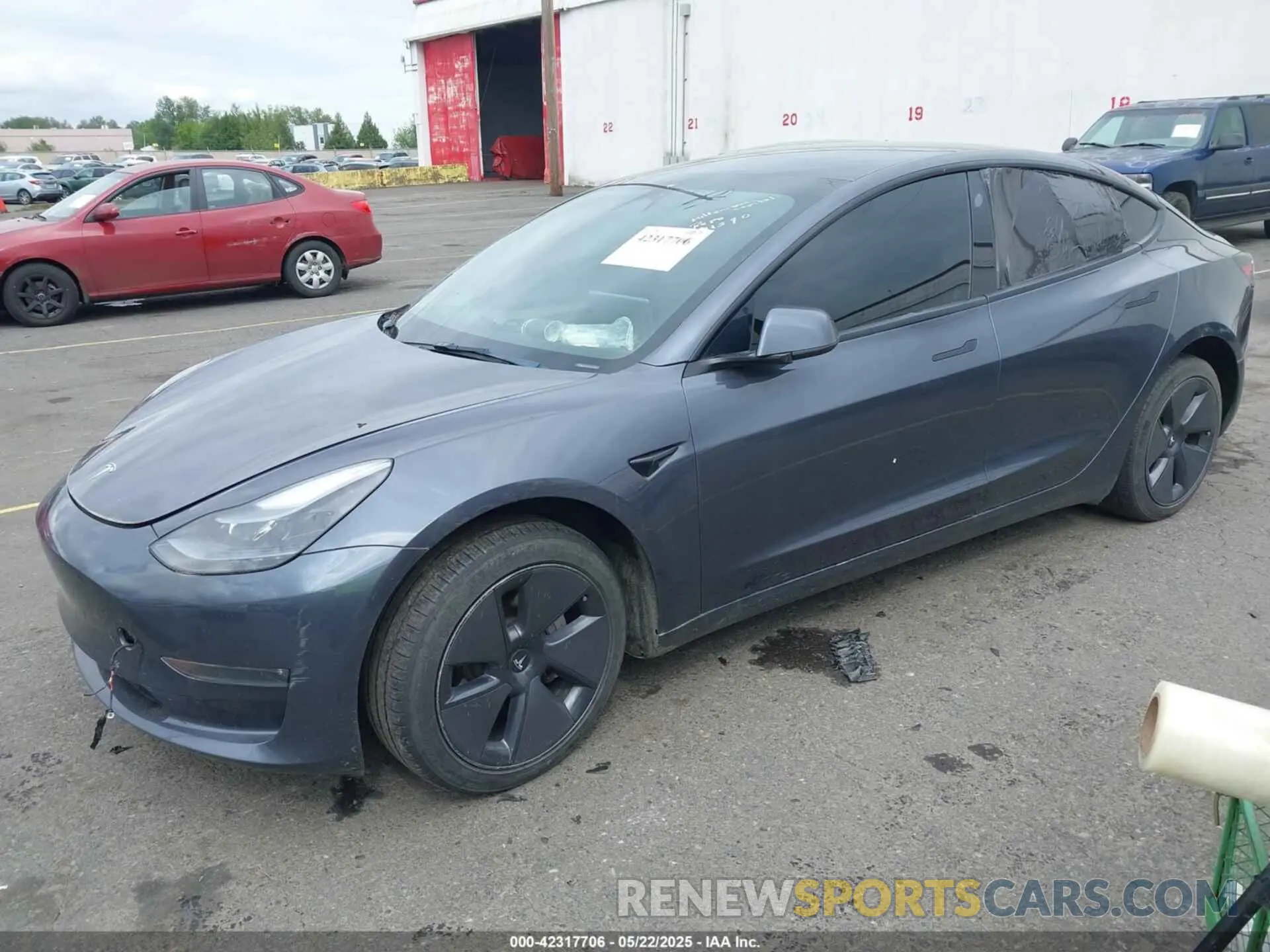 2 Photograph of a damaged car 5YJ3E1EB1PF391590 TESLA MODEL 3 2023