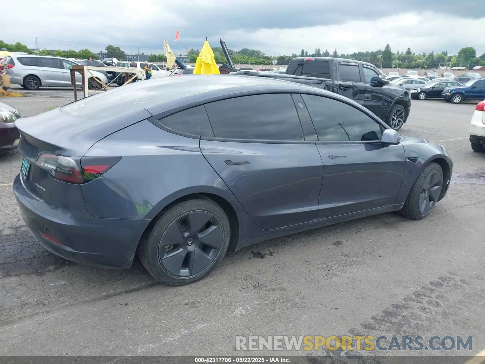 4 Photograph of a damaged car 5YJ3E1EB1PF391590 TESLA MODEL 3 2023