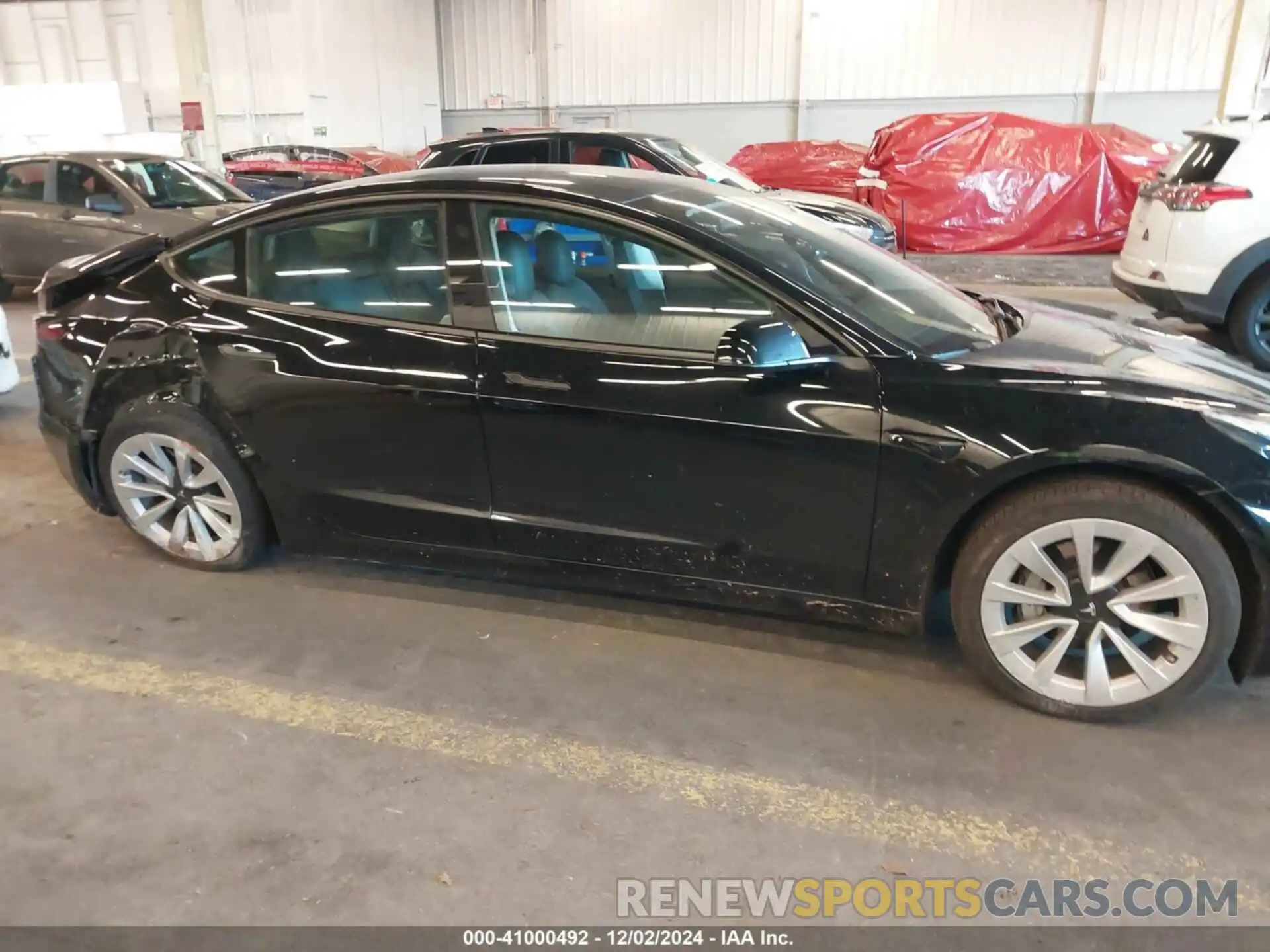 13 Photograph of a damaged car 5YJ3E1EB1PF470919 TESLA MODEL 3 2023