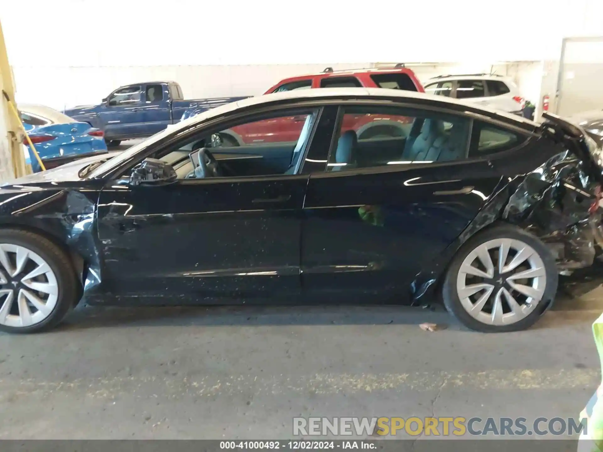 14 Photograph of a damaged car 5YJ3E1EB1PF470919 TESLA MODEL 3 2023