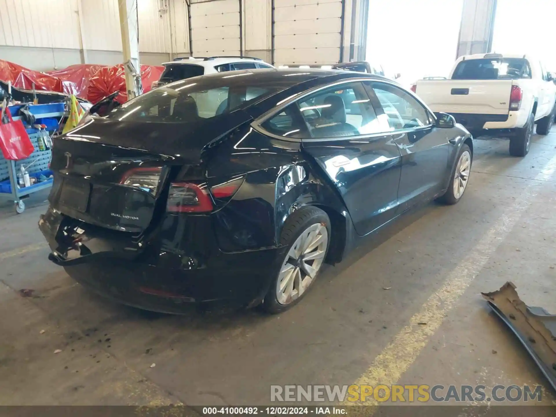 4 Photograph of a damaged car 5YJ3E1EB1PF470919 TESLA MODEL 3 2023