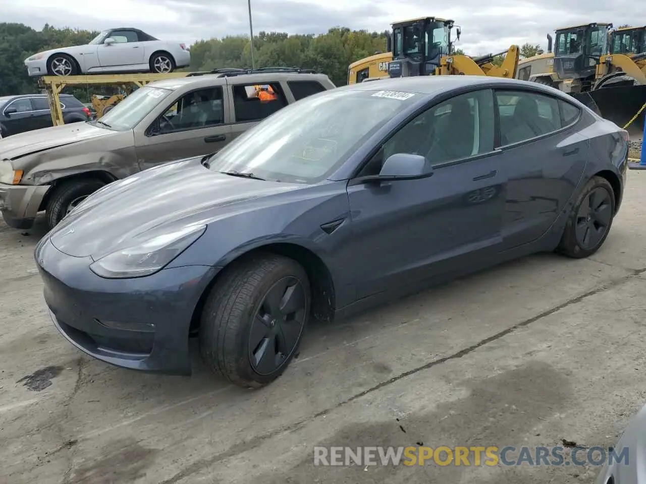 1 Photograph of a damaged car 5YJ3E1EB1PF634072 TESLA MODEL 3 2023