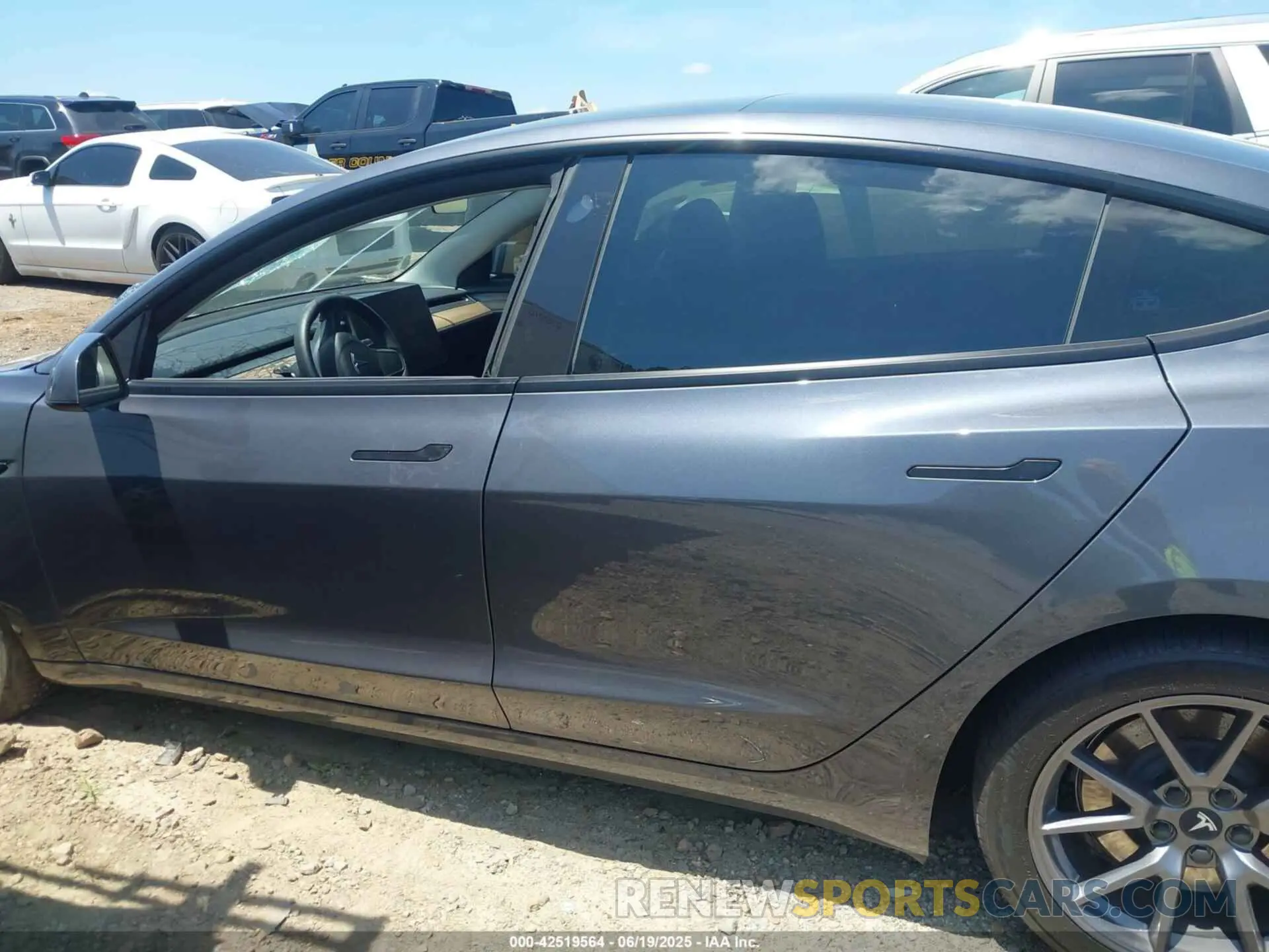 13 Photograph of a damaged car 5YJ3E1EB1PF663054 TESLA MODEL 3 2023