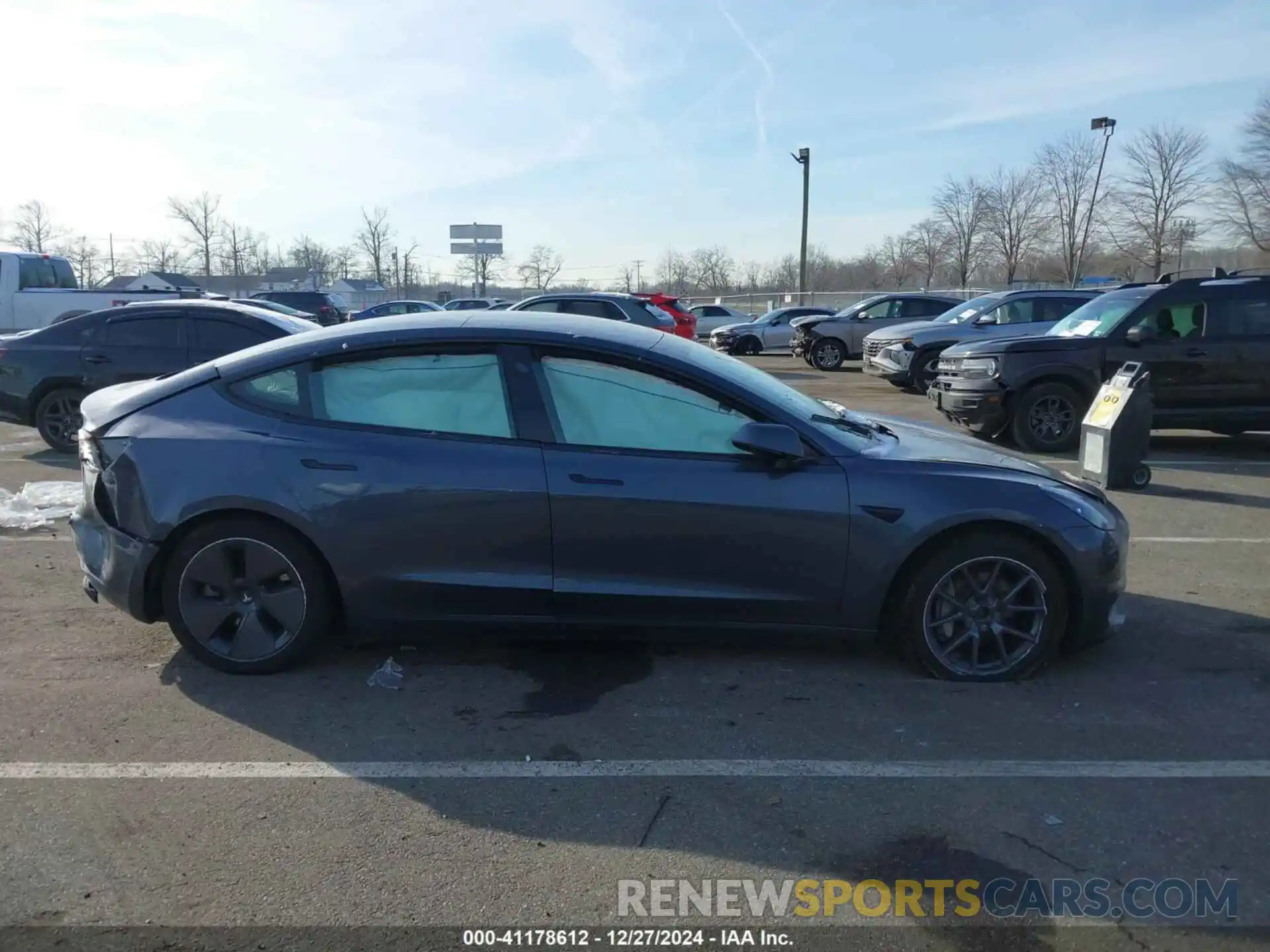 13 Photograph of a damaged car 5YJ3E1EB1PF703360 TESLA MODEL 3 2023