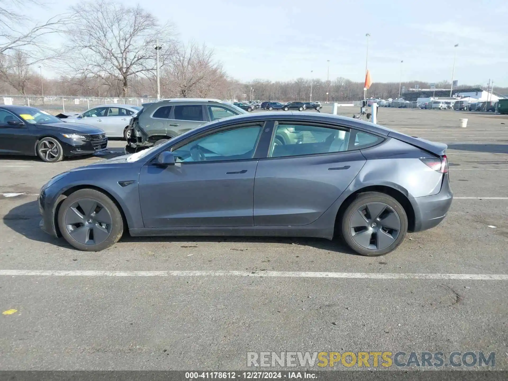 14 Photograph of a damaged car 5YJ3E1EB1PF703360 TESLA MODEL 3 2023