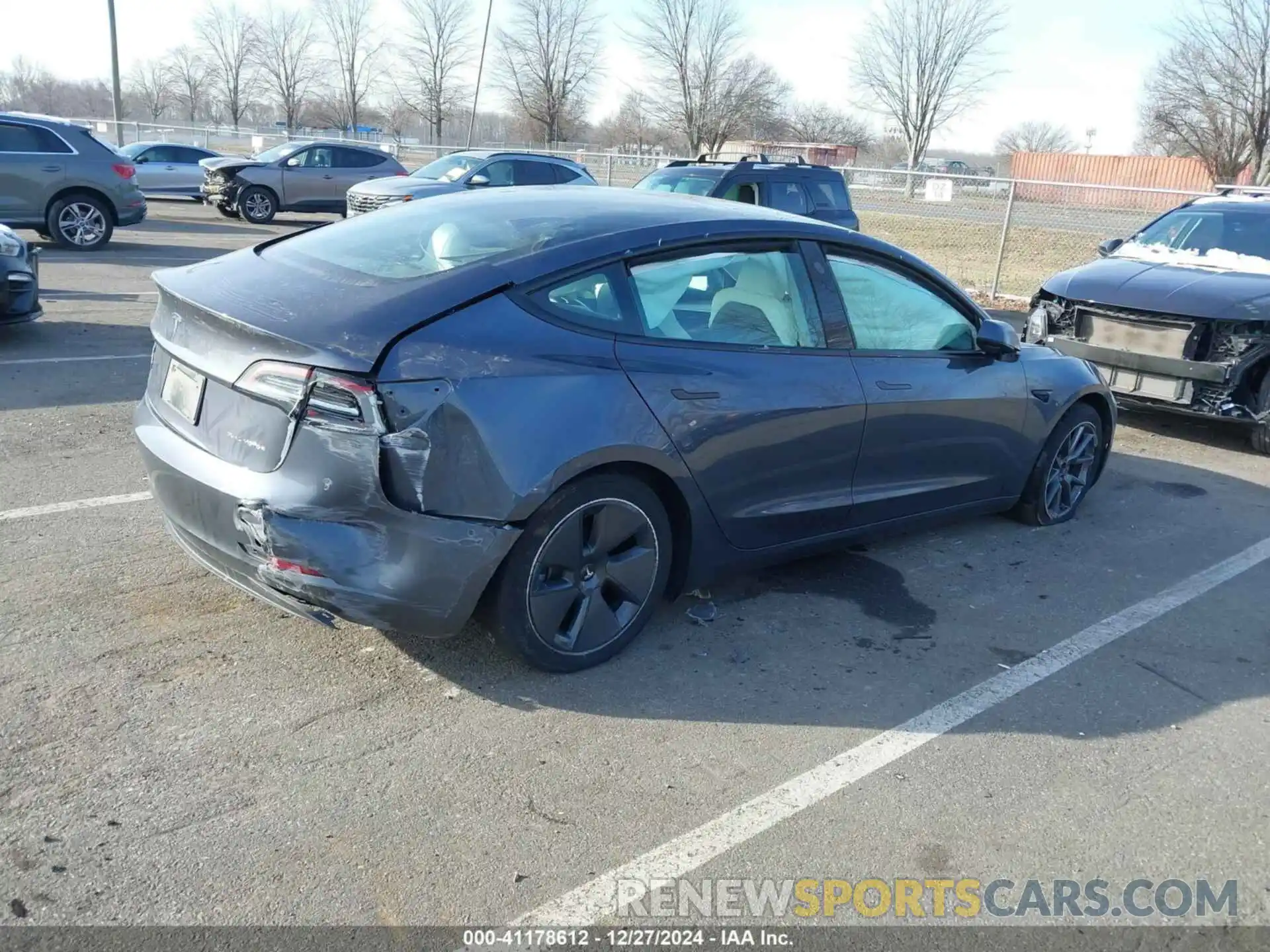 4 Photograph of a damaged car 5YJ3E1EB1PF703360 TESLA MODEL 3 2023