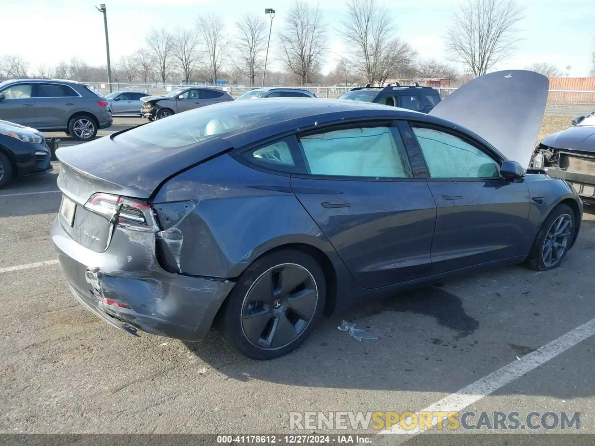 6 Photograph of a damaged car 5YJ3E1EB1PF703360 TESLA MODEL 3 2023