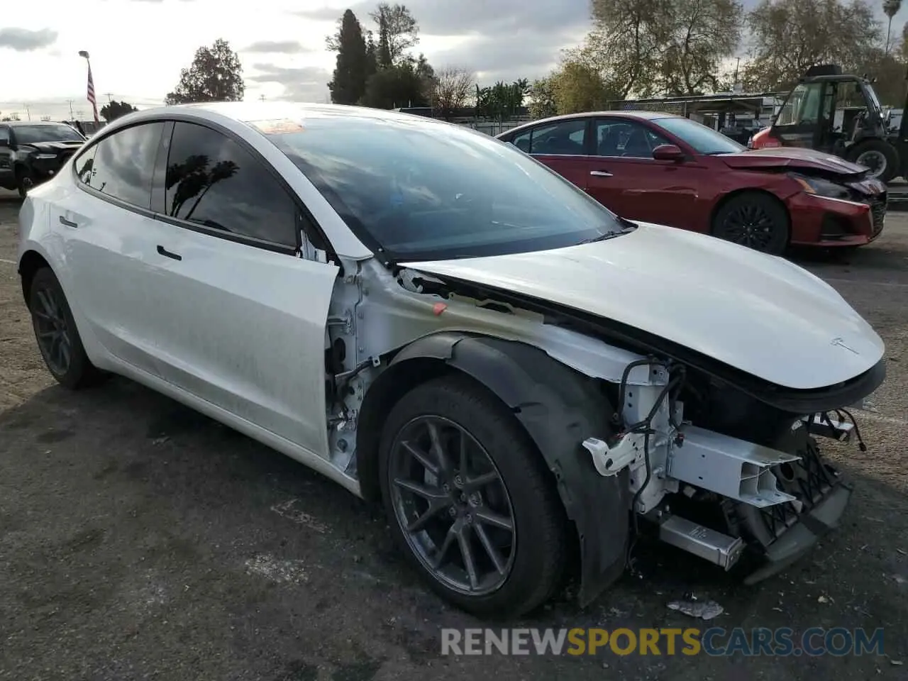 4 Photograph of a damaged car 5YJ3E1EB2PF603073 TESLA MODEL 3 2023