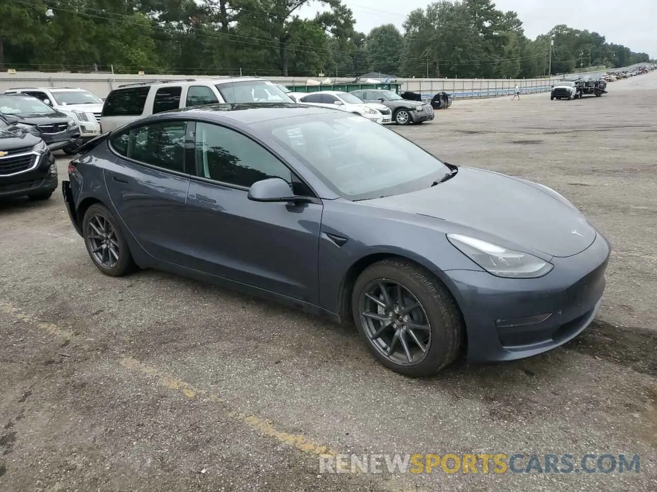 4 Photograph of a damaged car 5YJ3E1EB2PF688464 TESLA MODEL 3 2023