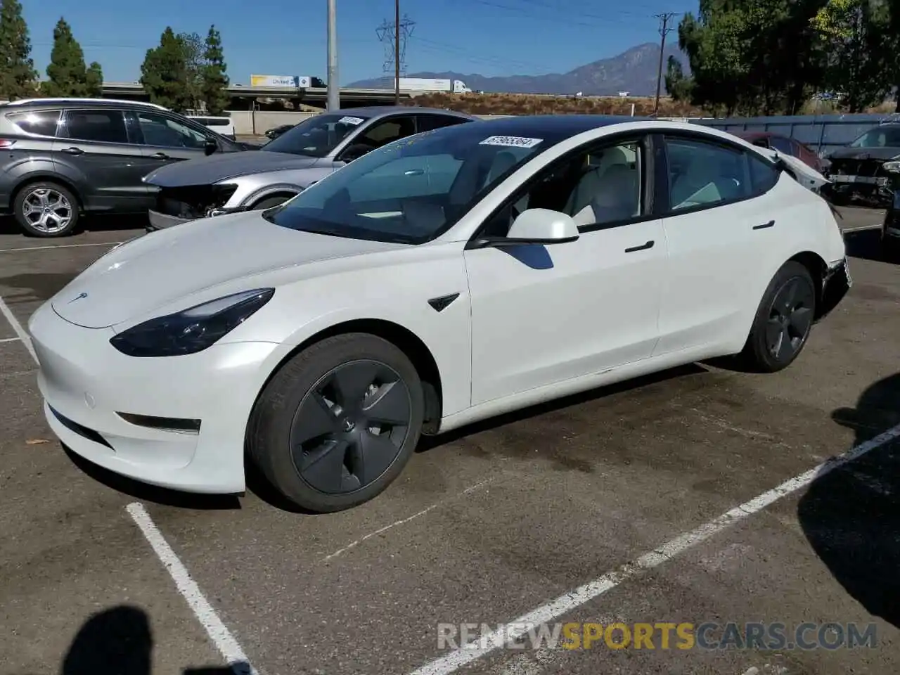 1 Photograph of a damaged car 5YJ3E1EB4PF598863 TESLA MODEL 3 2023