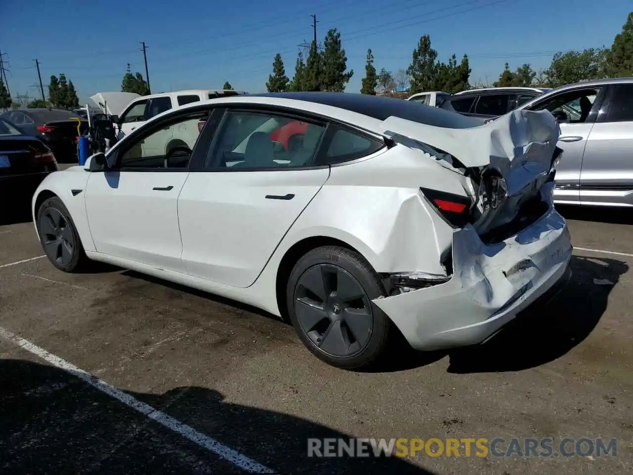 2 Photograph of a damaged car 5YJ3E1EB4PF598863 TESLA MODEL 3 2023