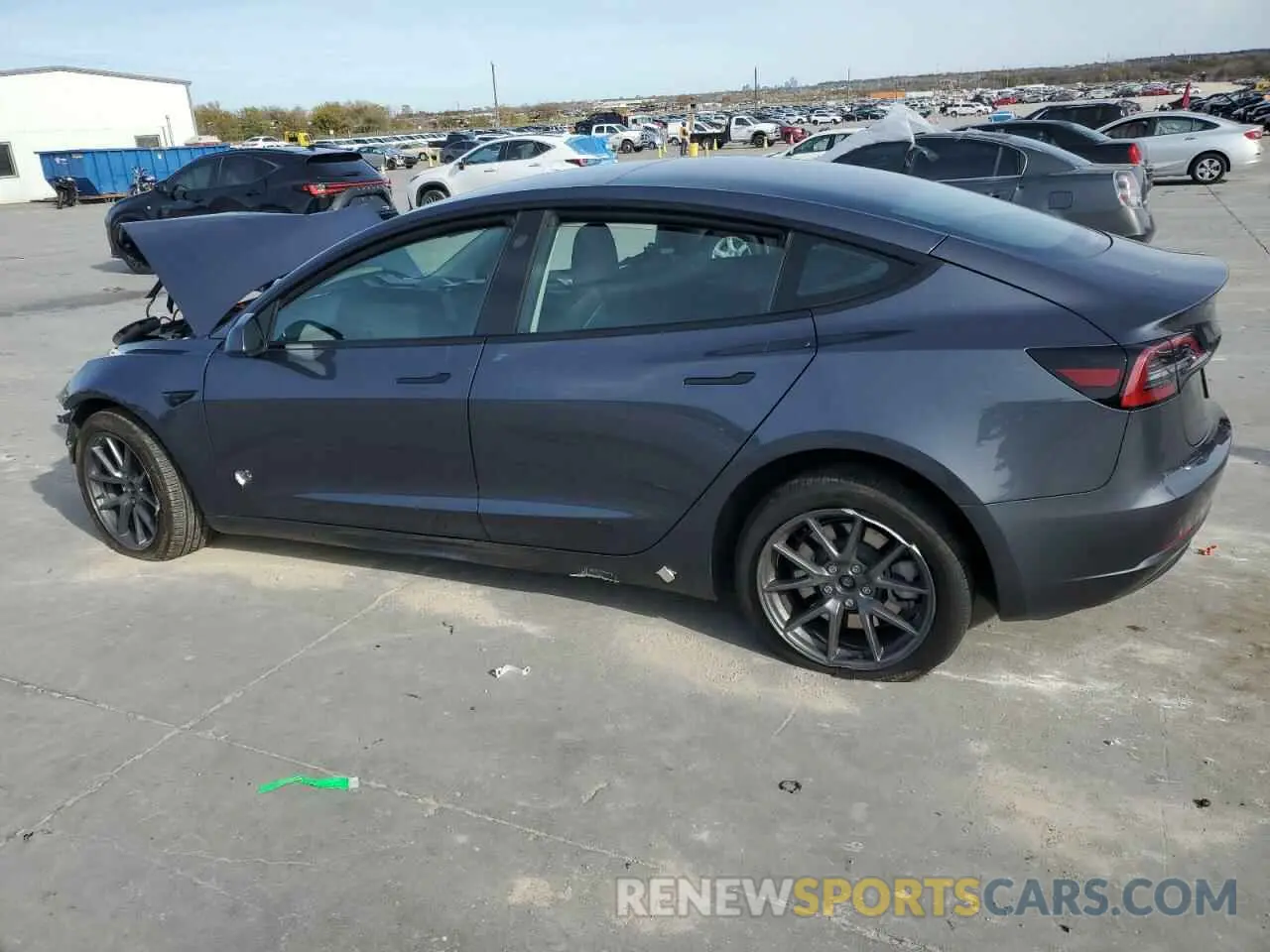 2 Photograph of a damaged car 5YJ3E1EB4PF665896 TESLA MODEL 3 2023