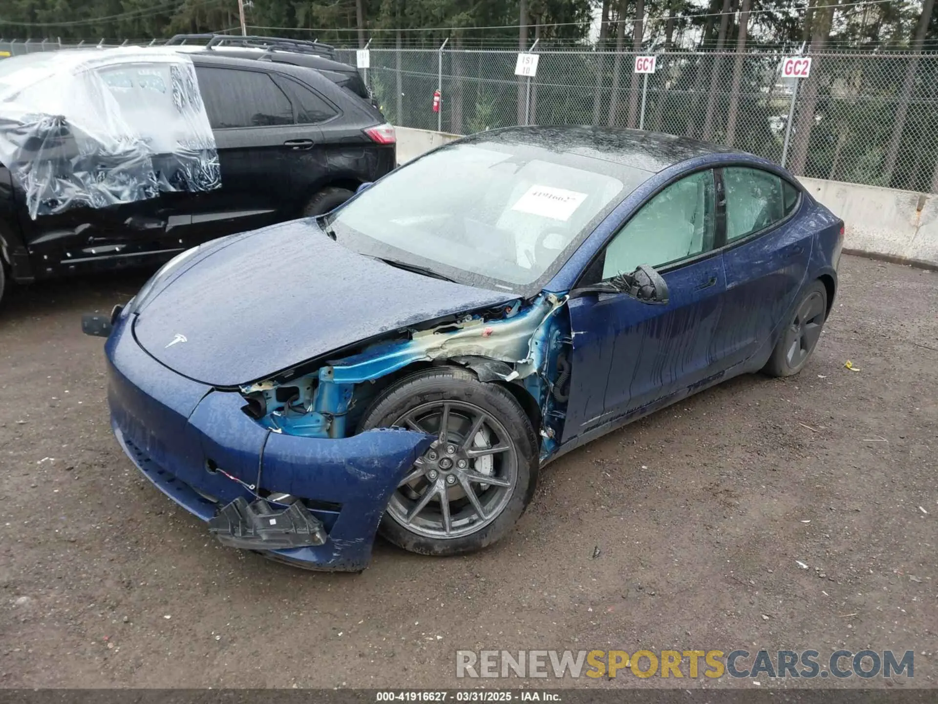 2 Photograph of a damaged car 5YJ3E1EB5PF704463 TESLA MODEL 3 2023