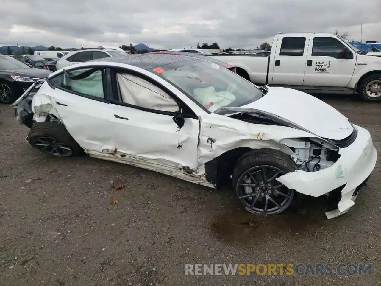 4 Photograph of a damaged car 5YJ3E1EB6PF387597 TESLA MODEL 3 2023