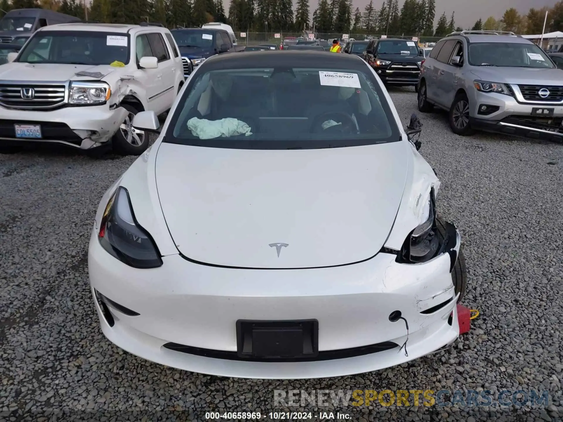 12 Photograph of a damaged car 5YJ3E1EB7PF603408 TESLA MODEL 3 2023
