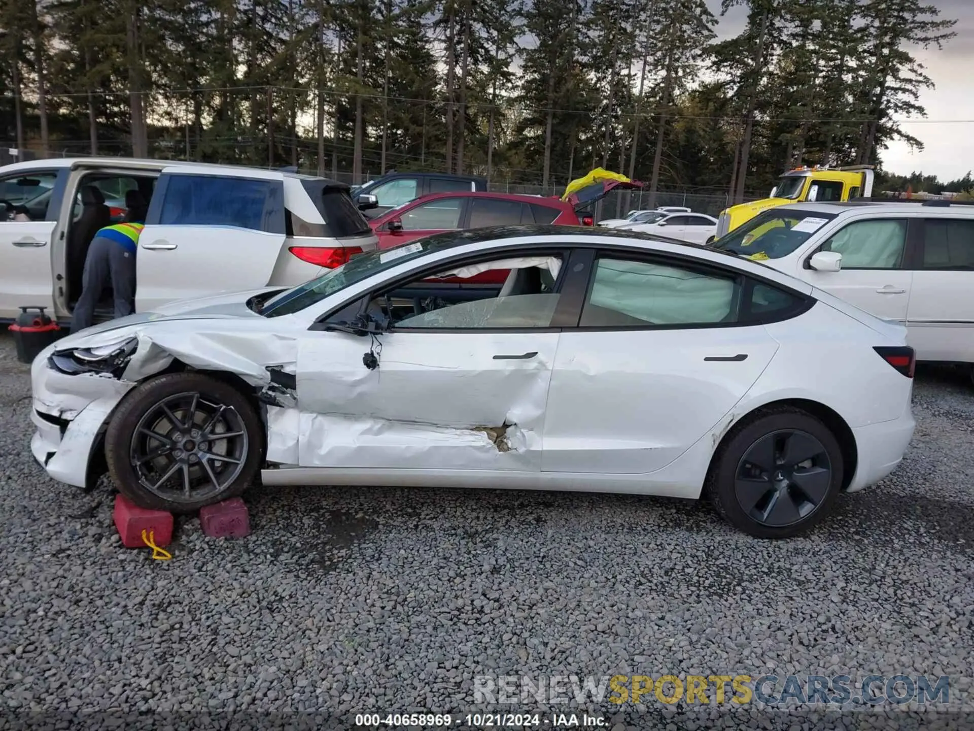 14 Photograph of a damaged car 5YJ3E1EB7PF603408 TESLA MODEL 3 2023