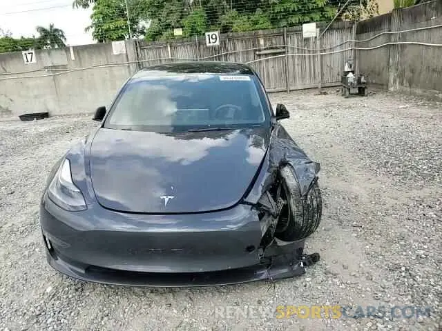 13 Photograph of a damaged car 5YJ3E1EB8PF392106 TESLA MODEL 3 2023