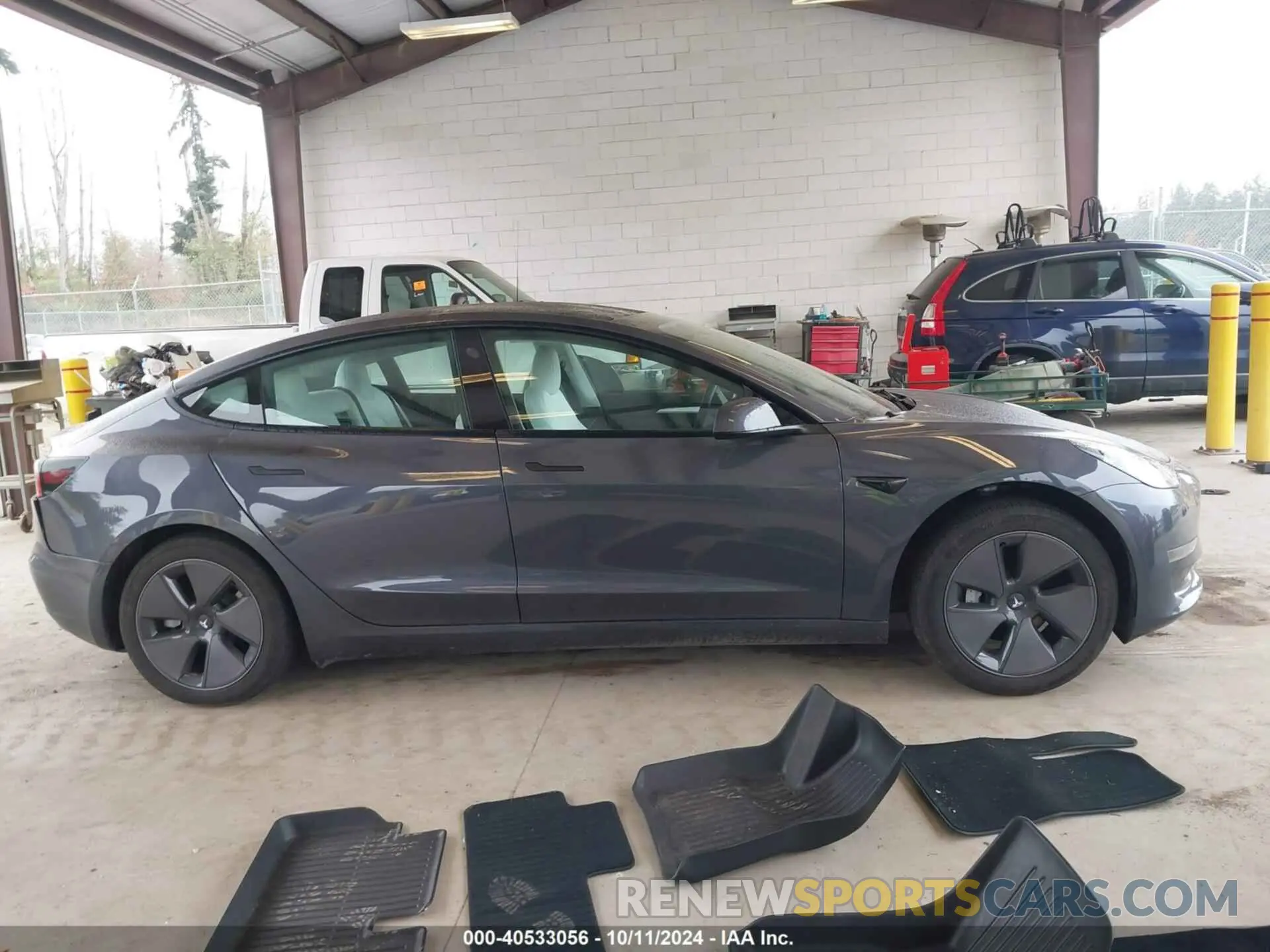 12 Photograph of a damaged car 5YJ3E1EB8PF618953 TESLA MODEL 3 2023