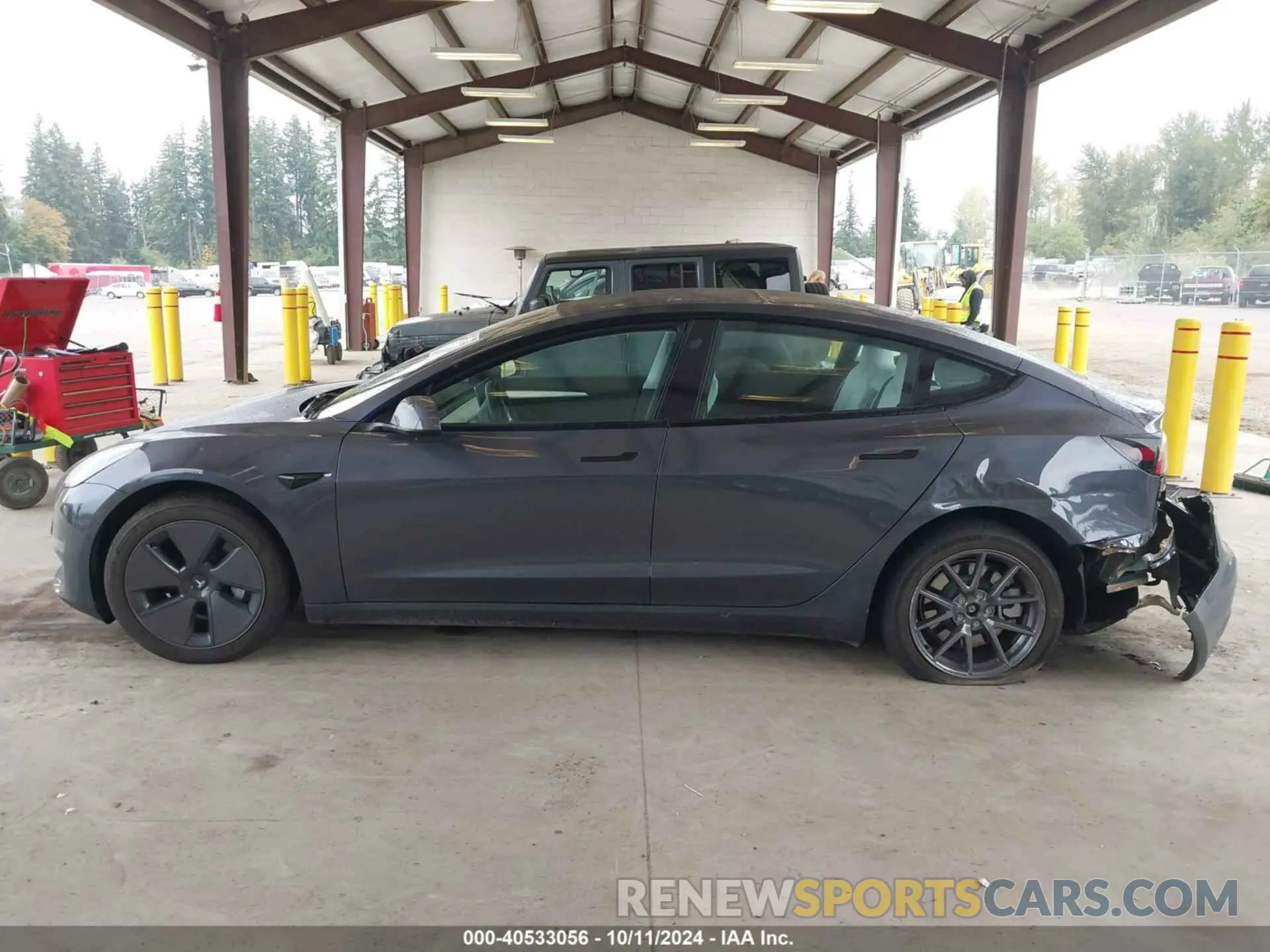 13 Photograph of a damaged car 5YJ3E1EB8PF618953 TESLA MODEL 3 2023