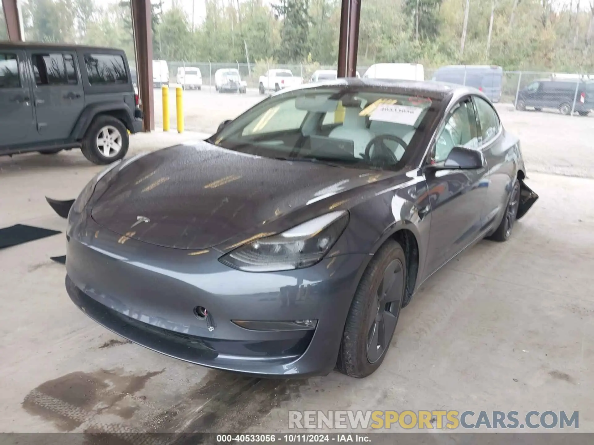 2 Photograph of a damaged car 5YJ3E1EB8PF618953 TESLA MODEL 3 2023