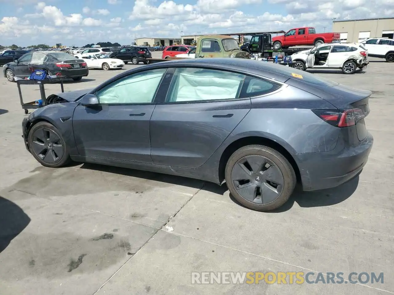 2 Photograph of a damaged car 5YJ3E1EB8PF631492 TESLA MODEL 3 2023