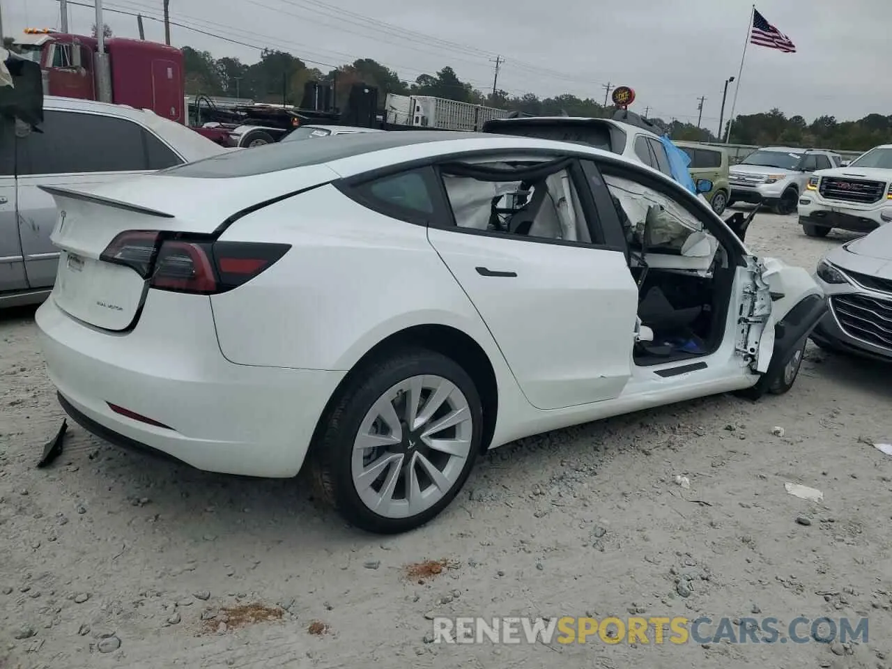 3 Photograph of a damaged car 5YJ3E1EB8PF665836 TESLA MODEL 3 2023