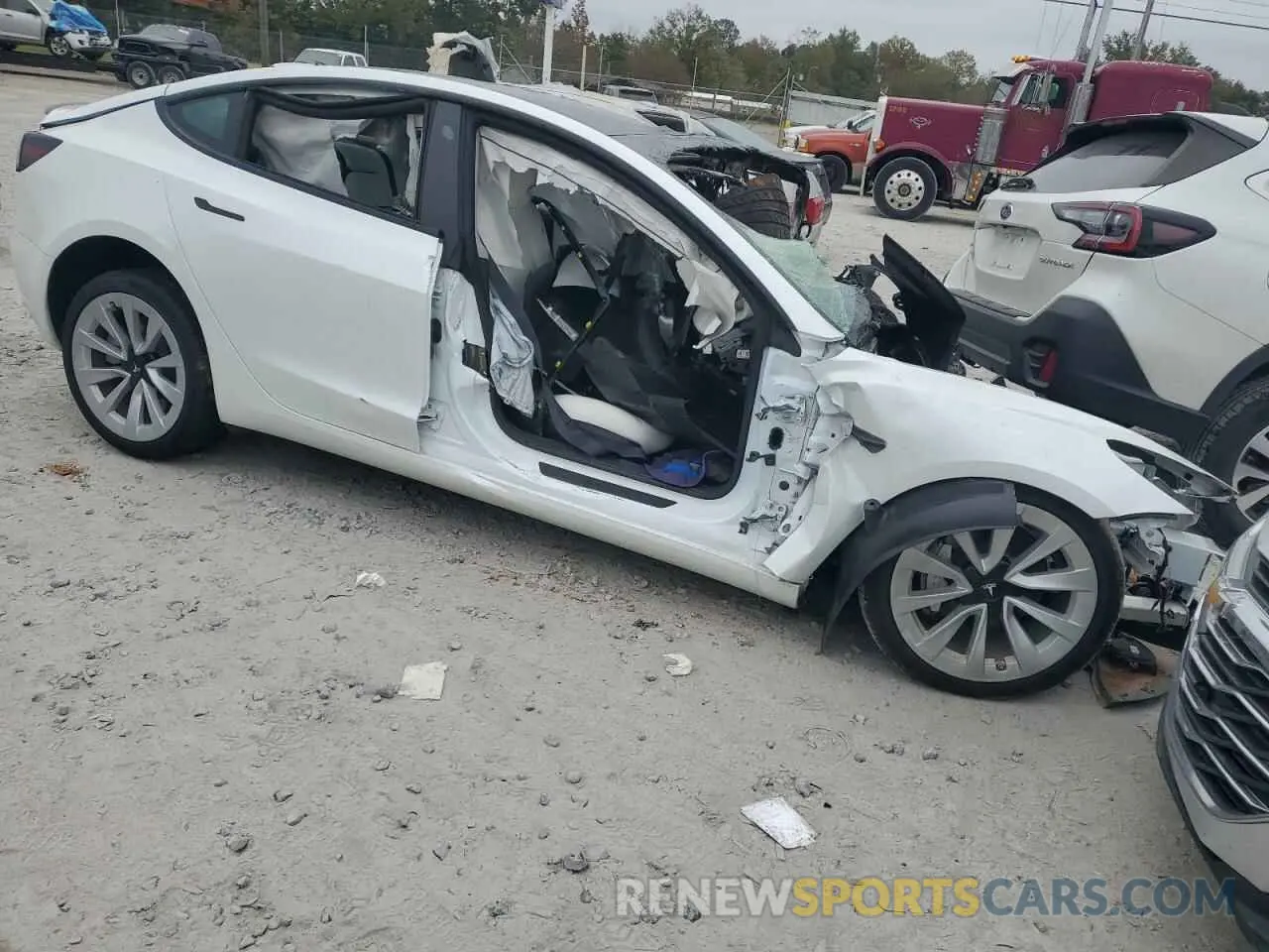 4 Photograph of a damaged car 5YJ3E1EB8PF665836 TESLA MODEL 3 2023