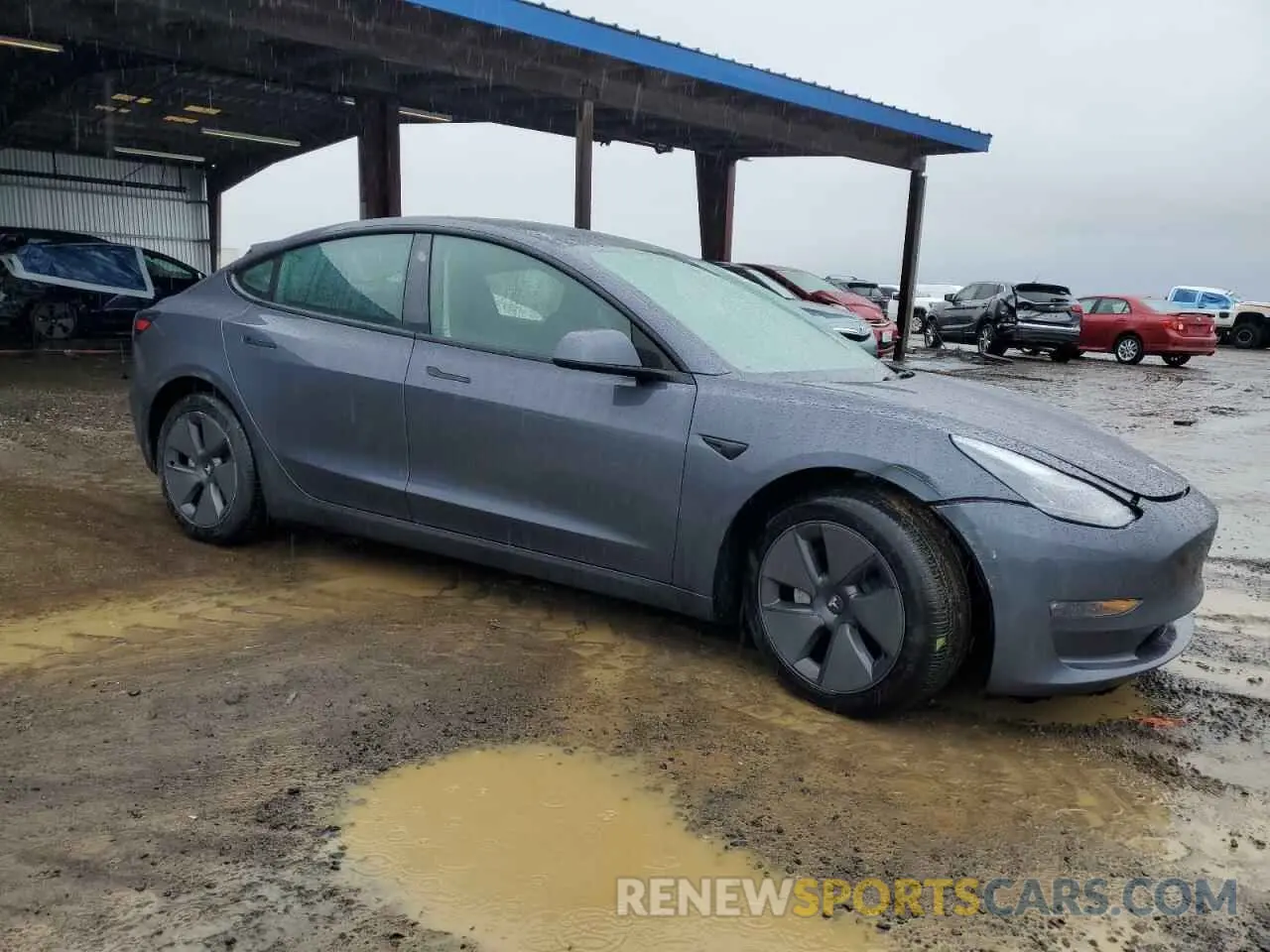 4 Photograph of a damaged car 5YJ3E1EB8PF713545 TESLA MODEL 3 2023