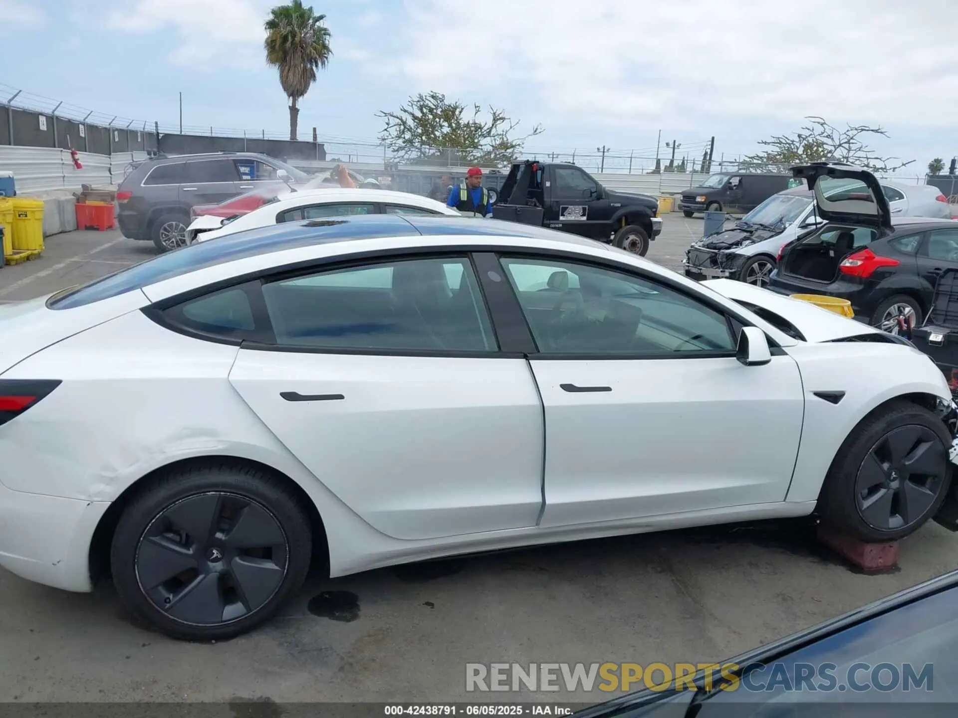 13 Photograph of a damaged car 5YJ3E1EB9PF393085 TESLA MODEL 3 2023