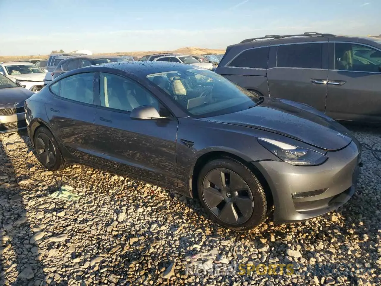 4 Photograph of a damaged car 5YJ3E1EB9PF696707 TESLA MODEL 3 2023