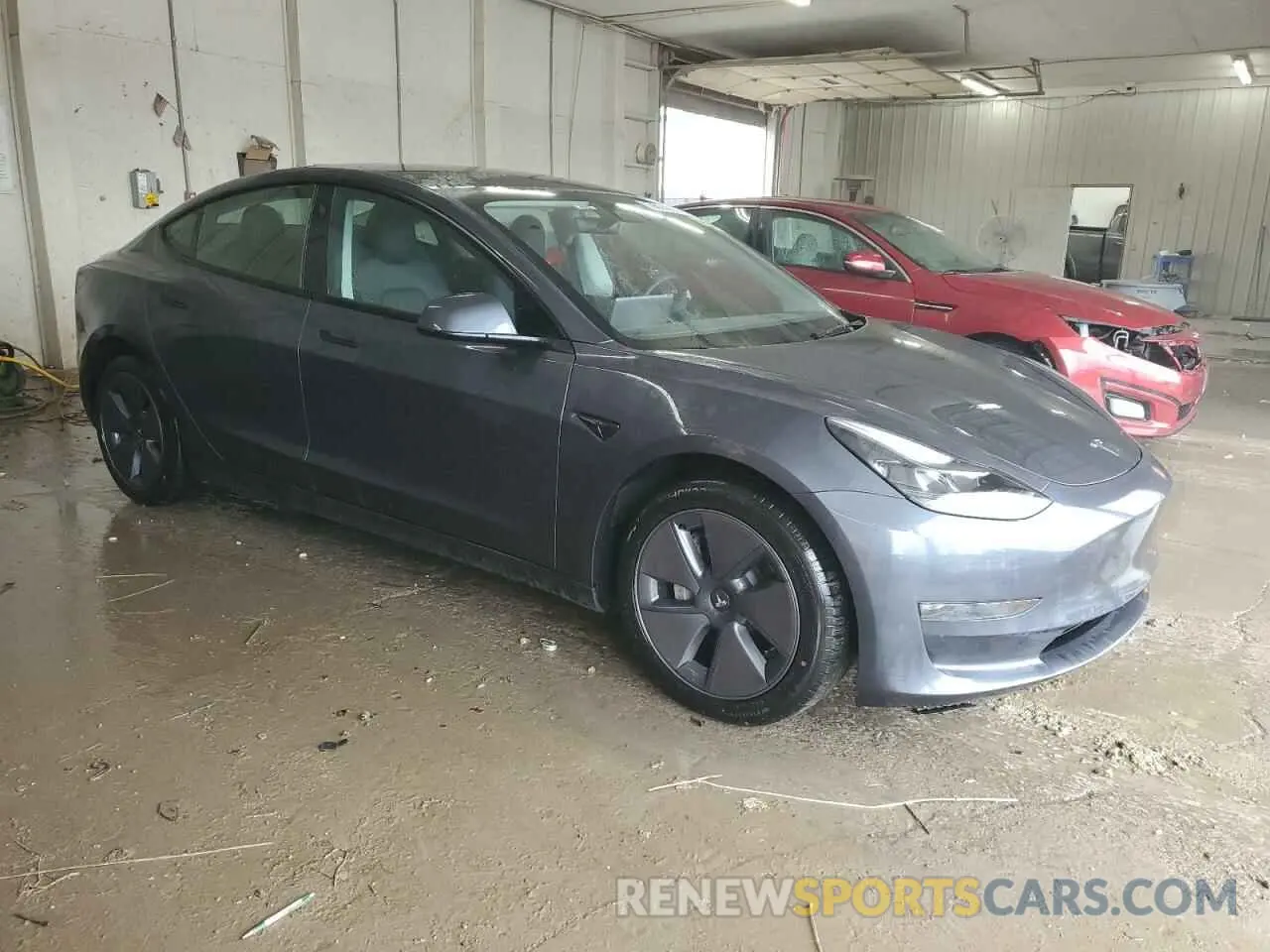 4 Photograph of a damaged car 5YJ3E1EBXPF706600 TESLA MODEL 3 2023