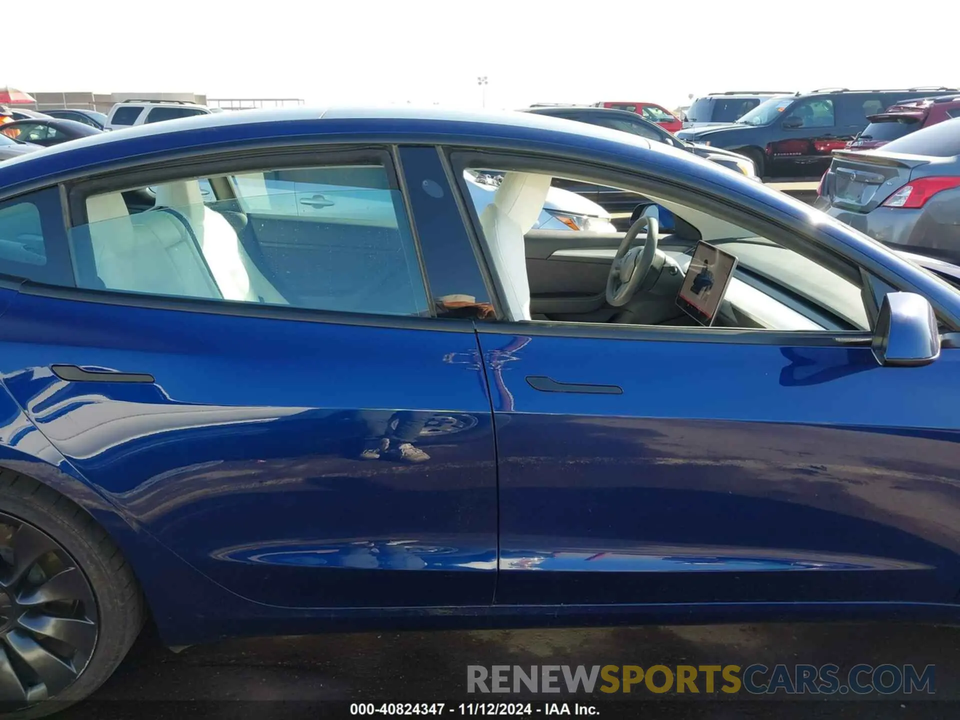 13 Photograph of a damaged car 5YJ3E1EC0PF399172 TESLA MODEL 3 2023