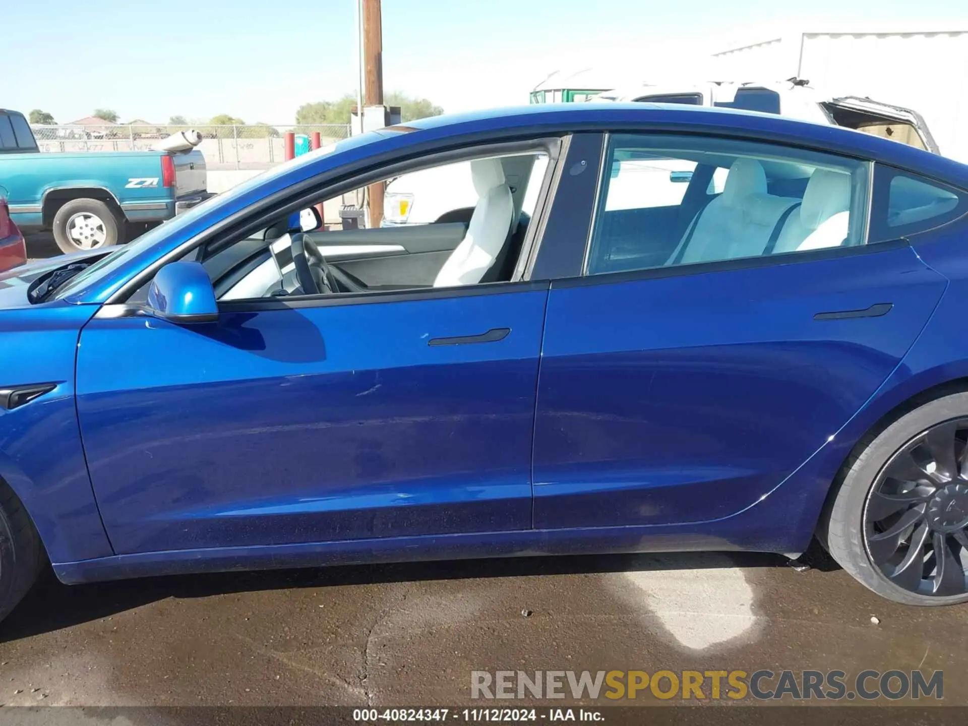 14 Photograph of a damaged car 5YJ3E1EC0PF399172 TESLA MODEL 3 2023