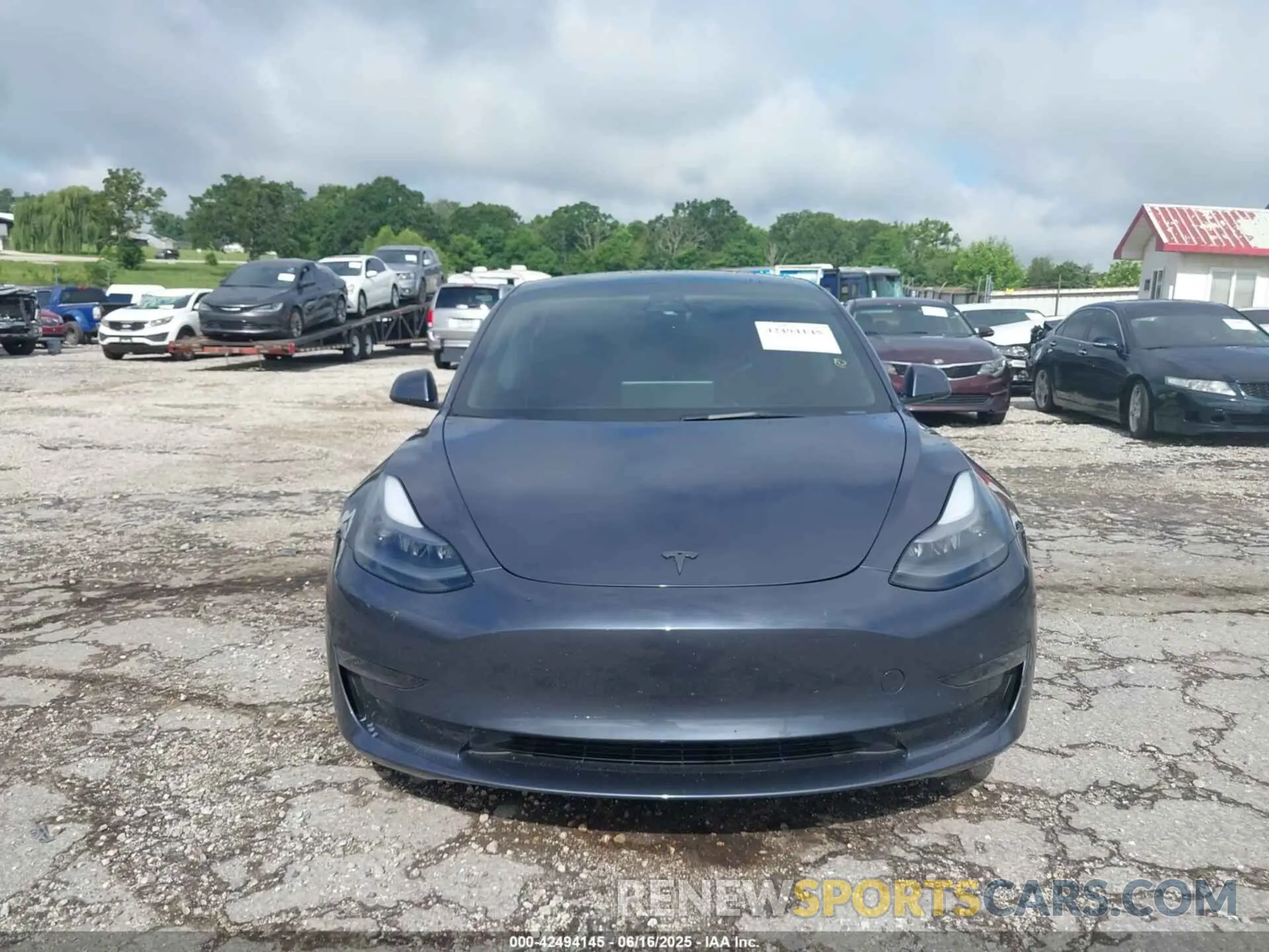12 Photograph of a damaged car 5YJ3E1EC0PF399284 TESLA MODEL 3 2023