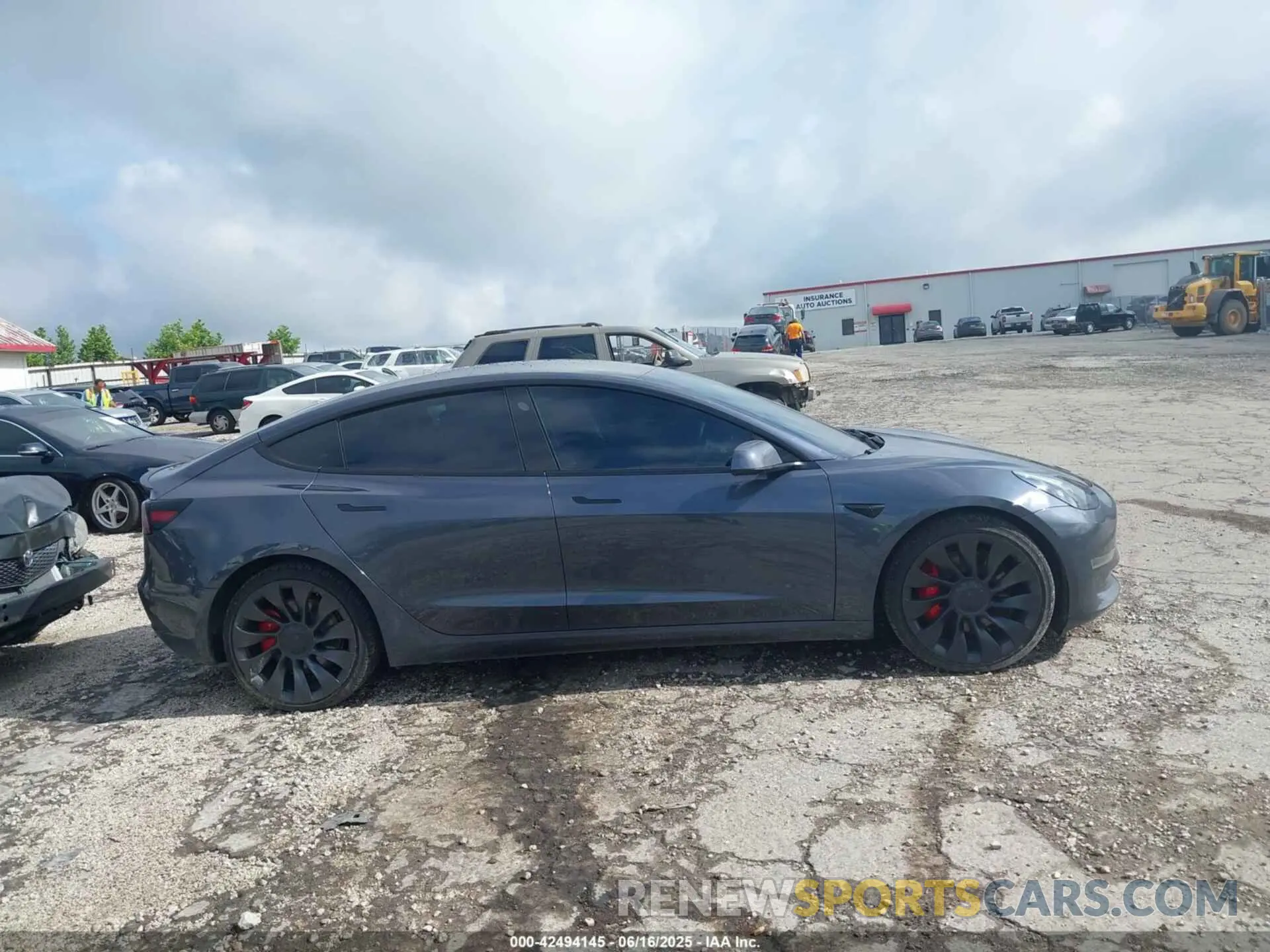 13 Photograph of a damaged car 5YJ3E1EC0PF399284 TESLA MODEL 3 2023