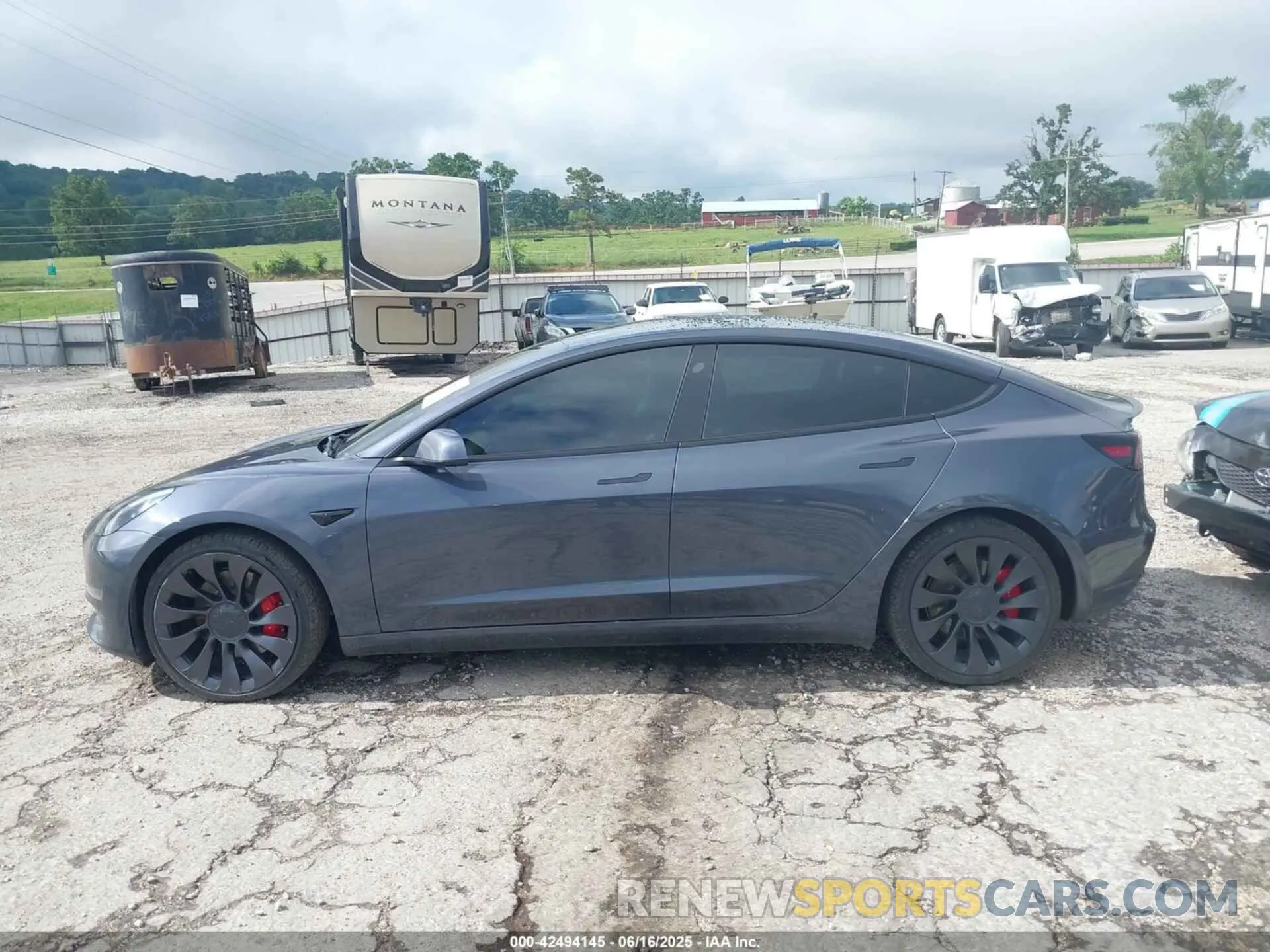 14 Photograph of a damaged car 5YJ3E1EC0PF399284 TESLA MODEL 3 2023