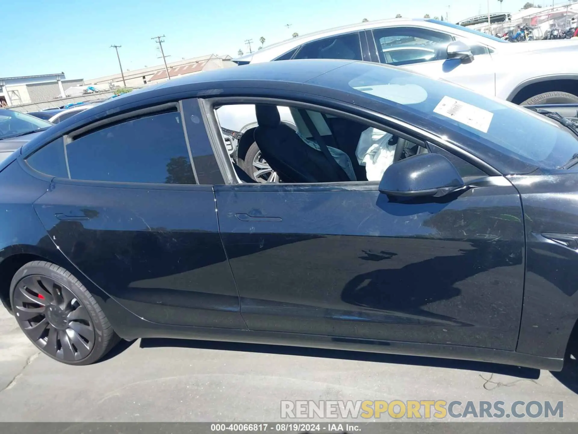 13 Photograph of a damaged car 5YJ3E1EC0PF412017 TESLA MODEL 3 2023