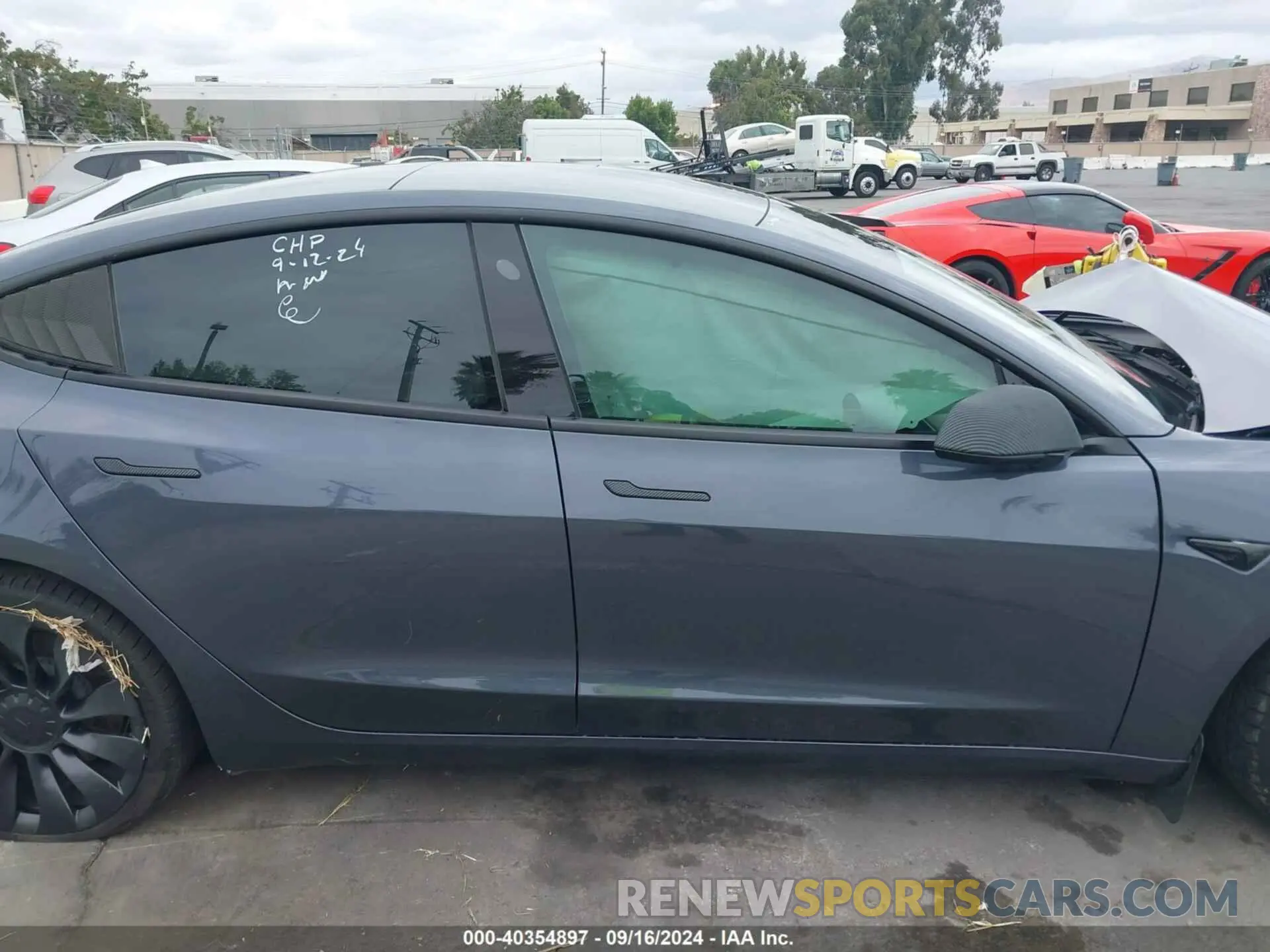 12 Photograph of a damaged car 5YJ3E1EC0PF498784 TESLA MODEL 3 2023