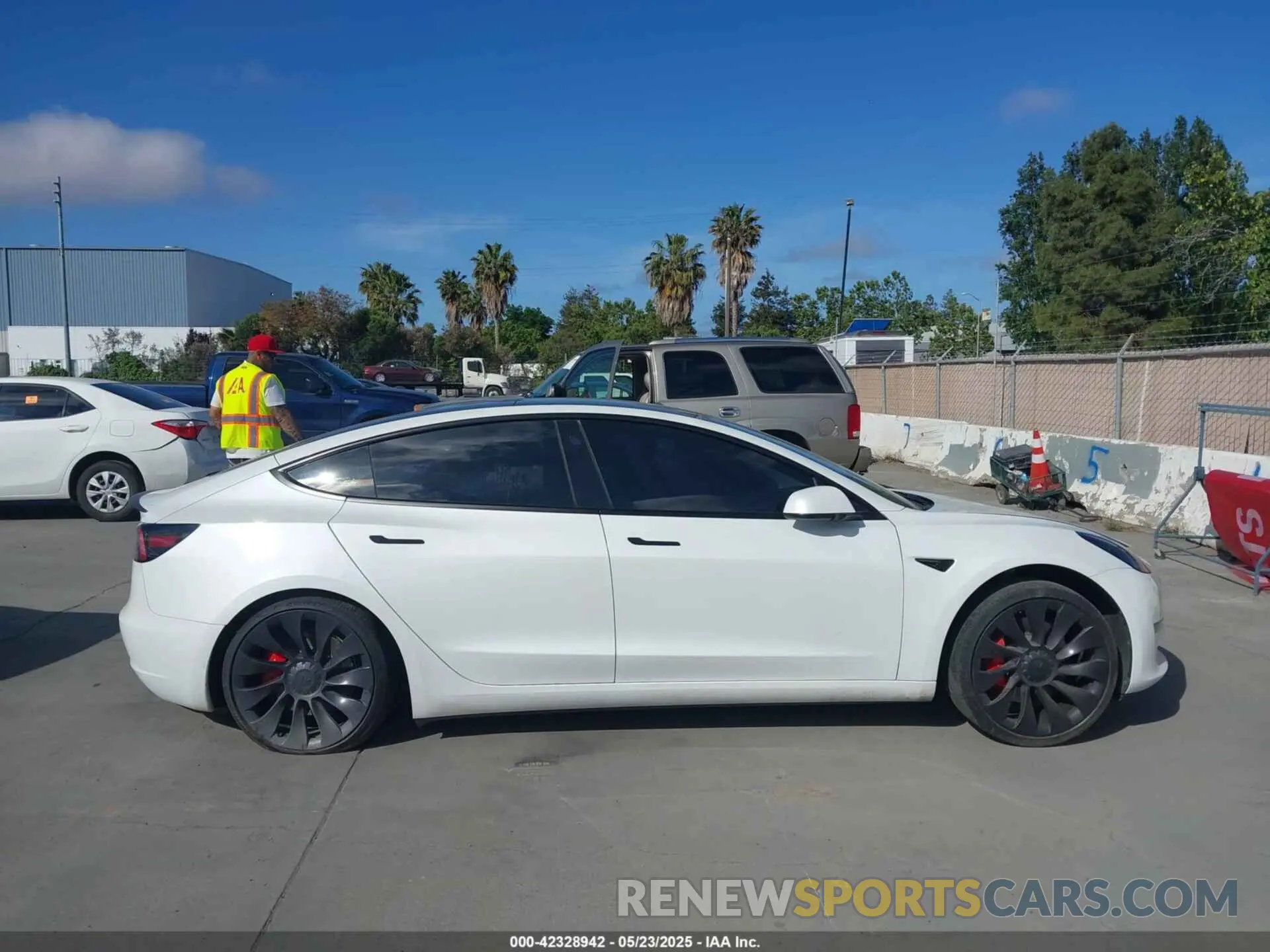 12 Photograph of a damaged car 5YJ3E1EC1PF608354 TESLA MODEL 3 2023