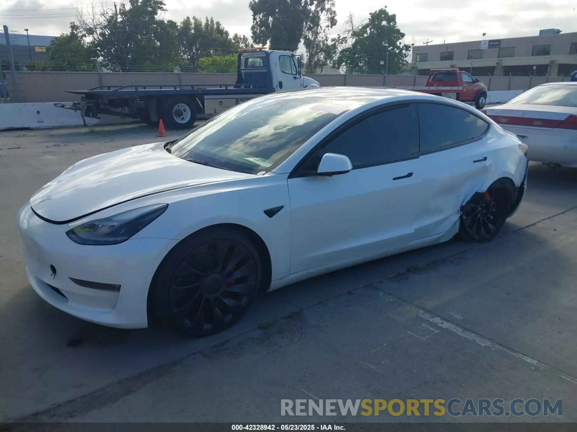 2 Photograph of a damaged car 5YJ3E1EC1PF608354 TESLA MODEL 3 2023