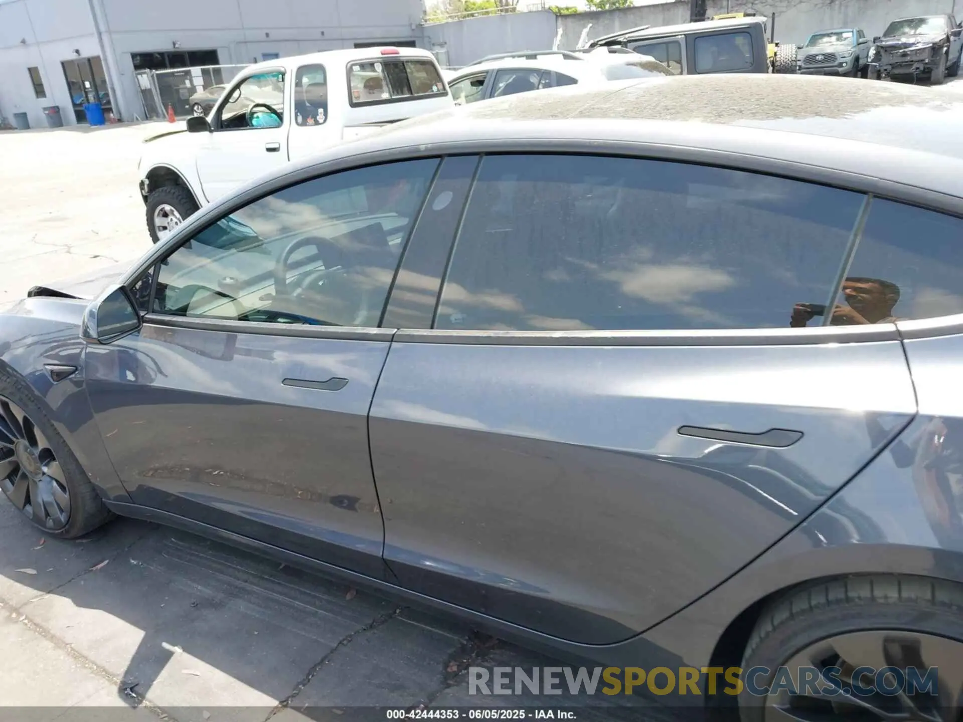 14 Photograph of a damaged car 5YJ3E1EC1PF706557 TESLA MODEL 3 2023