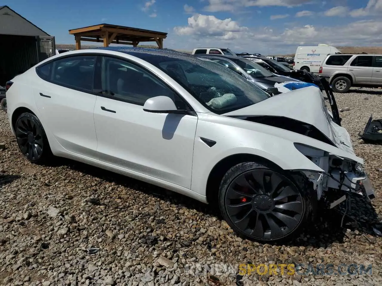 4 Photograph of a damaged car 5YJ3E1EC1PF706879 TESLA MODEL 3 2023