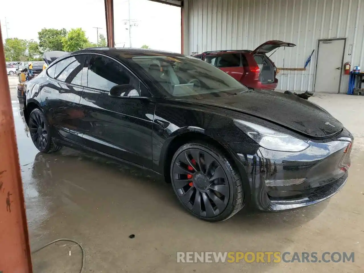 4 Photograph of a damaged car 5YJ3E1EC1PF712665 TESLA MODEL 3 2023