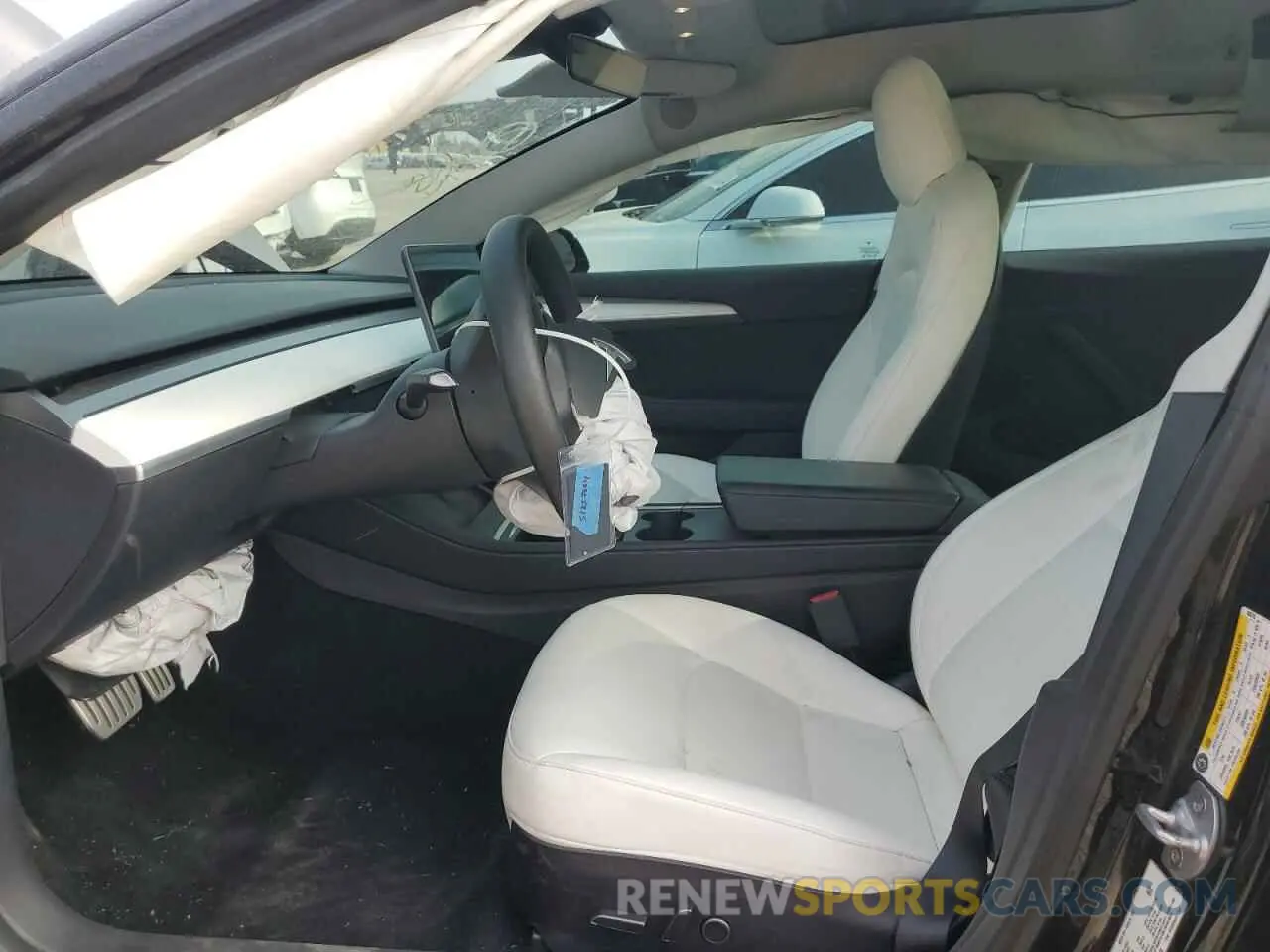 7 Photograph of a damaged car 5YJ3E1EC2PF406218 TESLA MODEL 3 2023