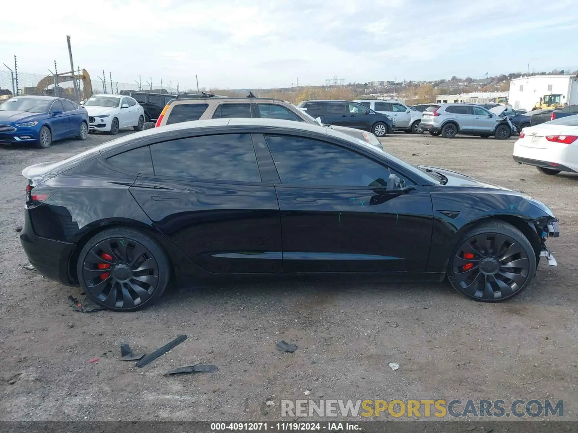 12 Photograph of a damaged car 5YJ3E1EC2PF506531 TESLA MODEL 3 2023