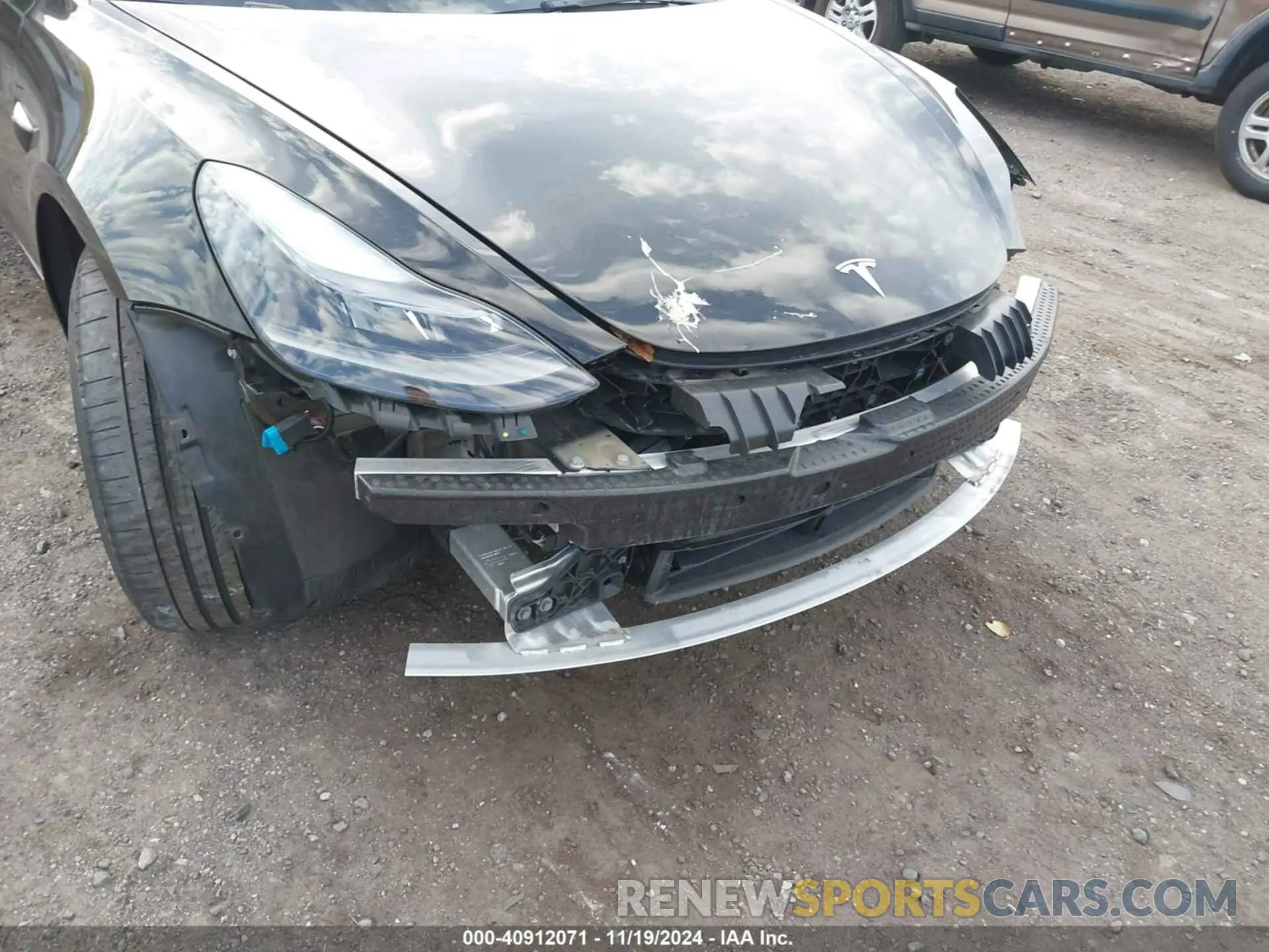 18 Photograph of a damaged car 5YJ3E1EC2PF506531 TESLA MODEL 3 2023