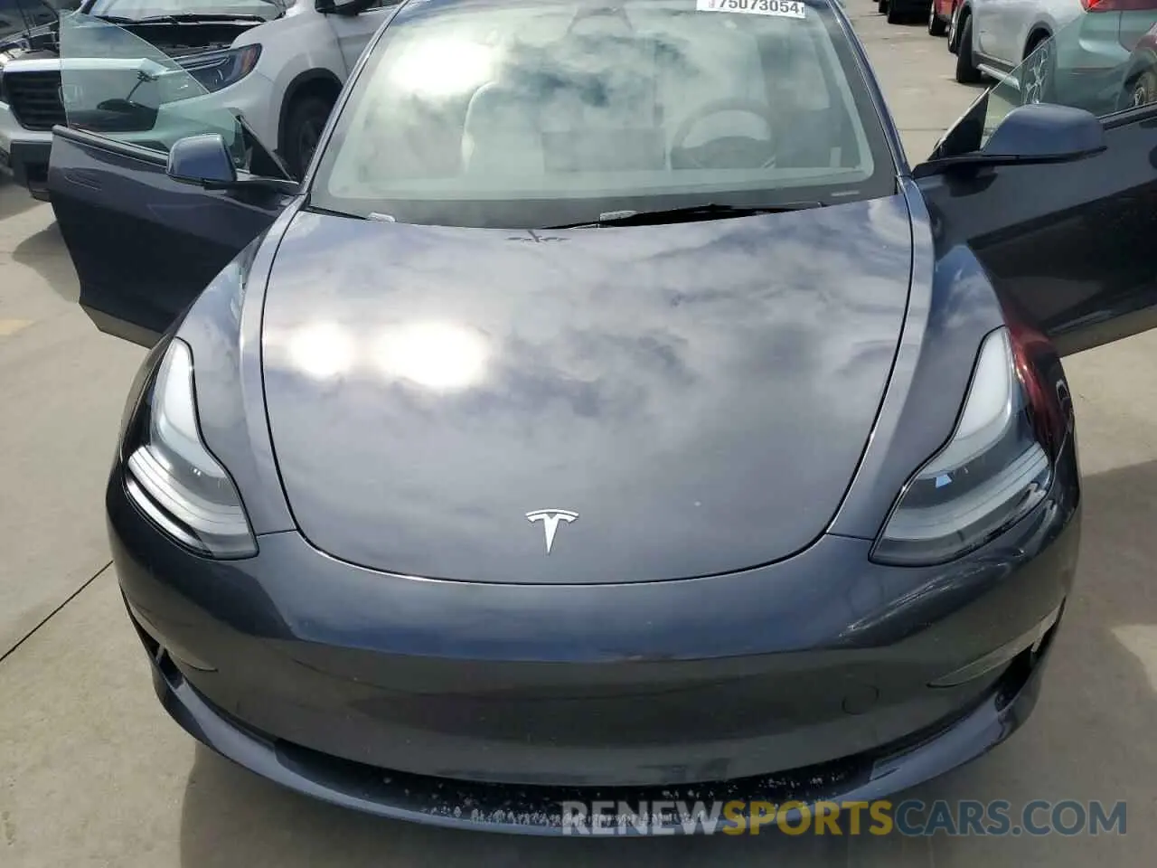 11 Photograph of a damaged car 5YJ3E1EC2PF677330 TESLA MODEL 3 2023