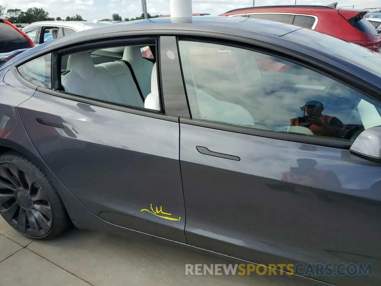 12 Photograph of a damaged car 5YJ3E1EC2PF677330 TESLA MODEL 3 2023