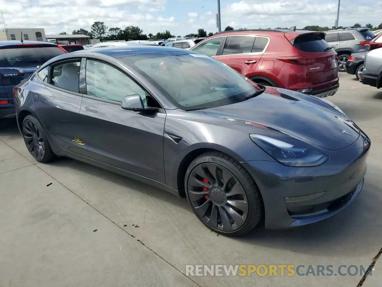 4 Photograph of a damaged car 5YJ3E1EC2PF677330 TESLA MODEL 3 2023